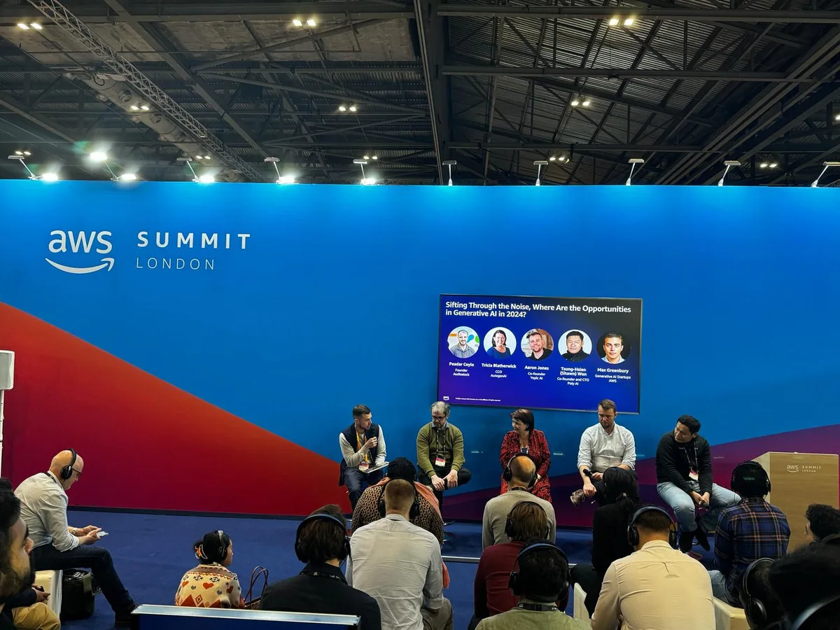 Aaron with fellow panellists on the AWS Summit London stage